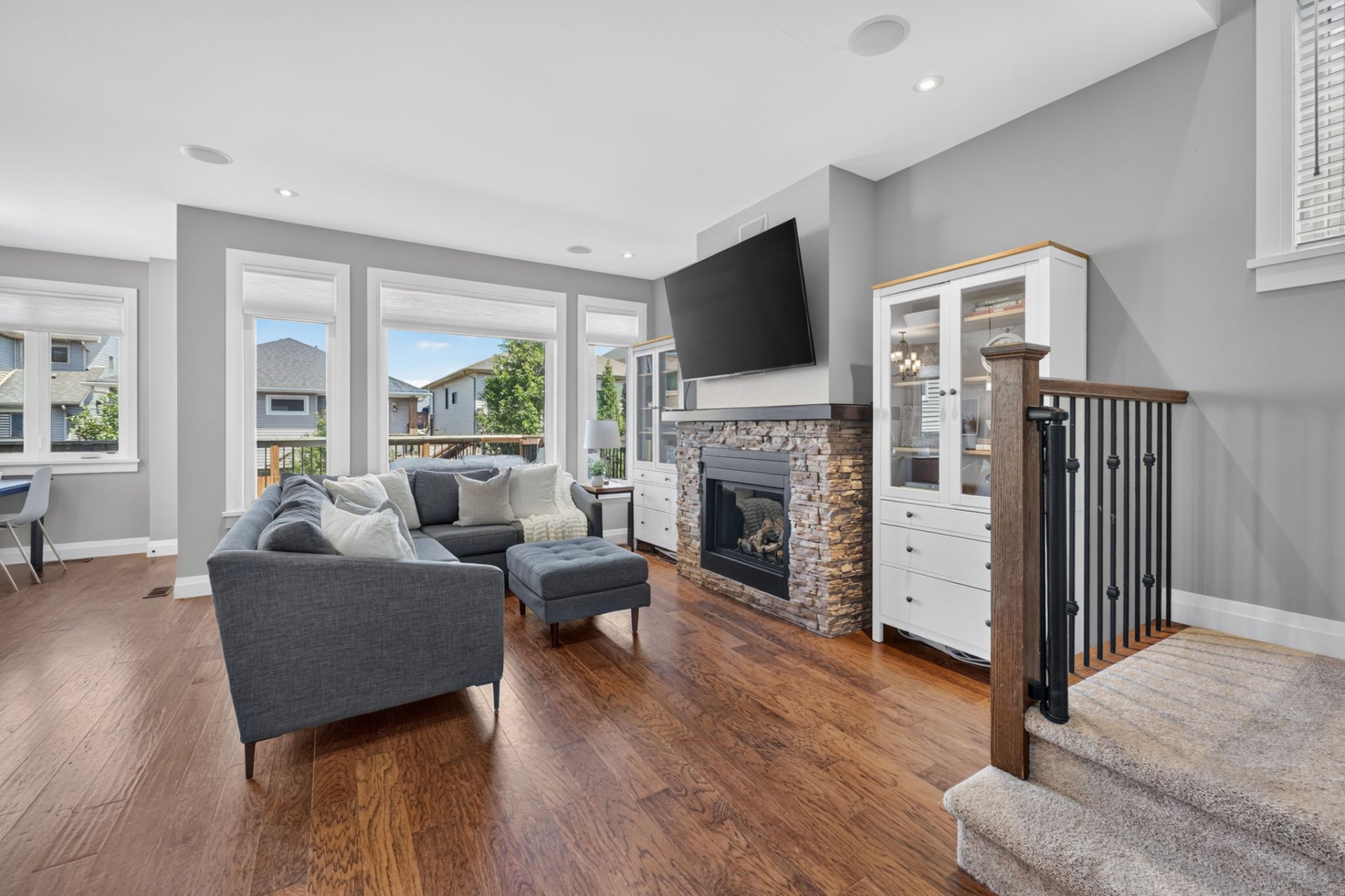 A cultured-stone hearth, wall to wall.