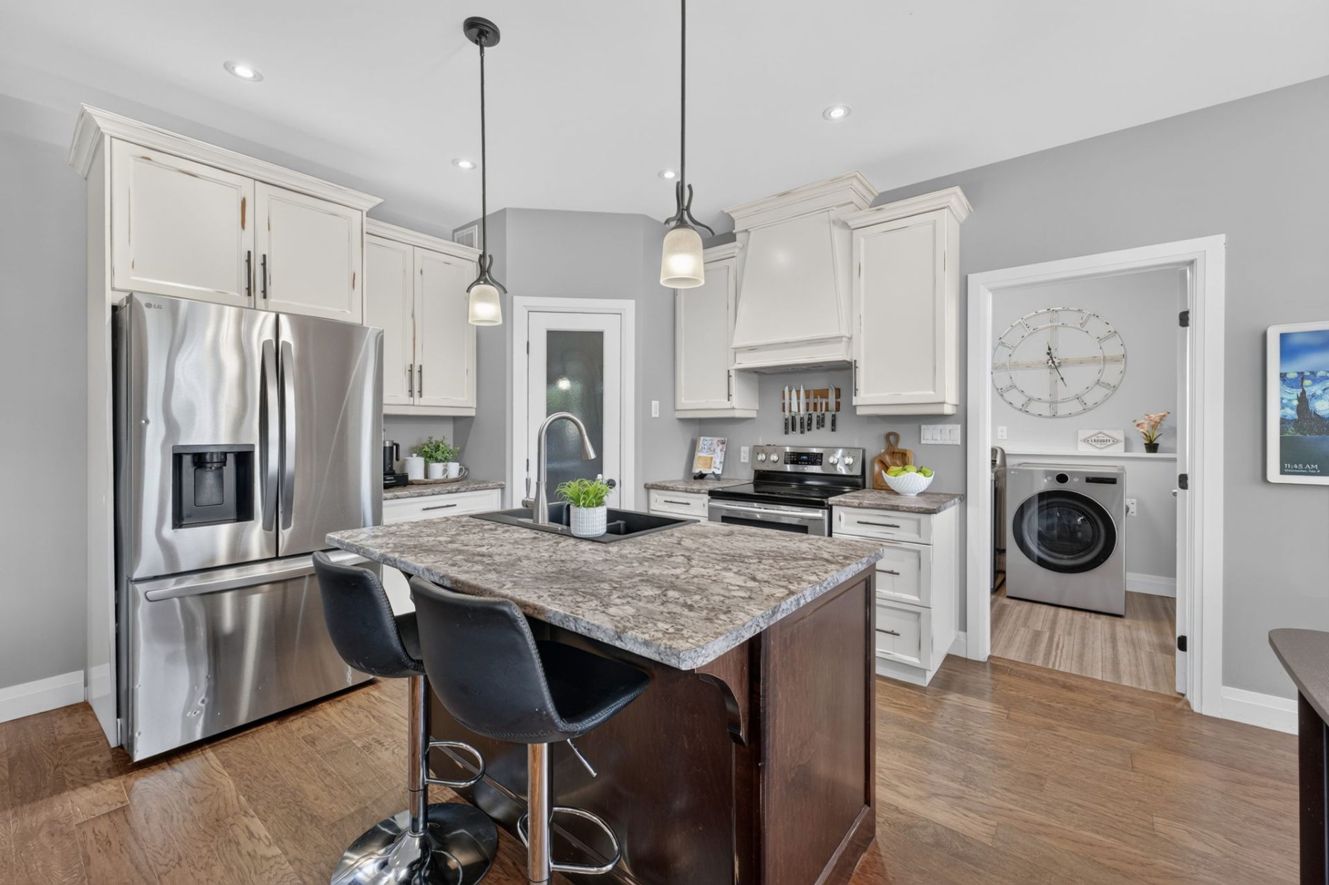 An open kitchen with a walk-in pantry.